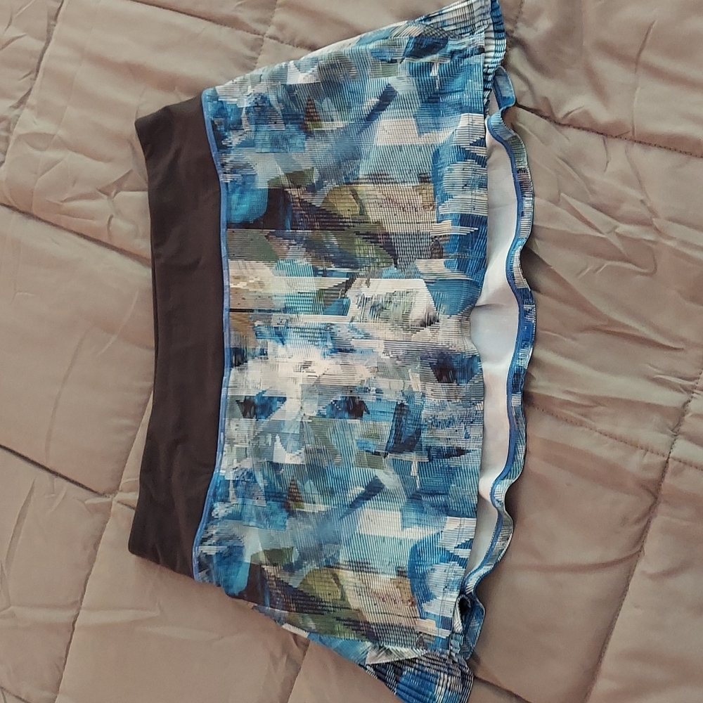 Lululemon blue and green skirt with and built in black shorts.